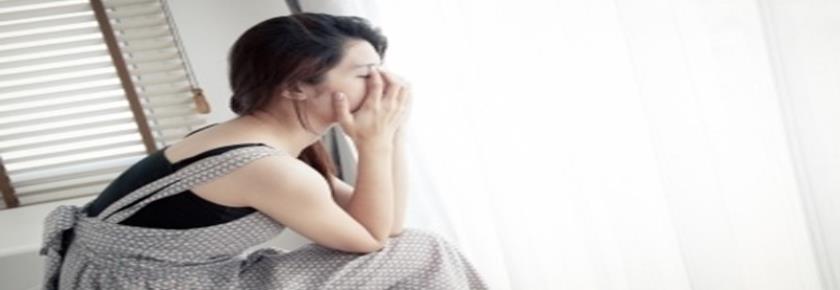 Sad Woman Sitting Alone