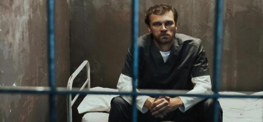 Man in prison cell